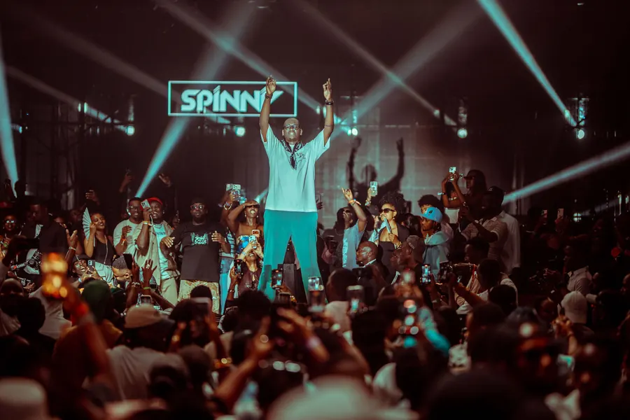 On stage, Spinny and Friends Kampala 2025
