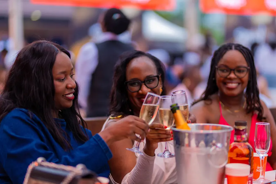 Friends at the table, Spinny and Friends Kampala 2025